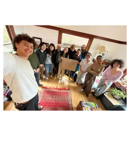 Volunteer team with Cecilia Lunaparra sign